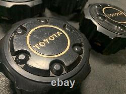 (4) 91-93 TOYOTA LAND CRUISER FJ80 OEM WHEEL CENTER CAPS Black Alloy Wheels 15