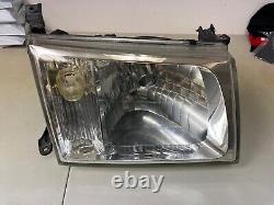 98-05 OEM Toyota Land Cruiser 100 Series Front Passenger Side Headlight Assembly